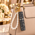 Porte-clé flacon noire rechargeable de parfum à strass avec bracelet perlé